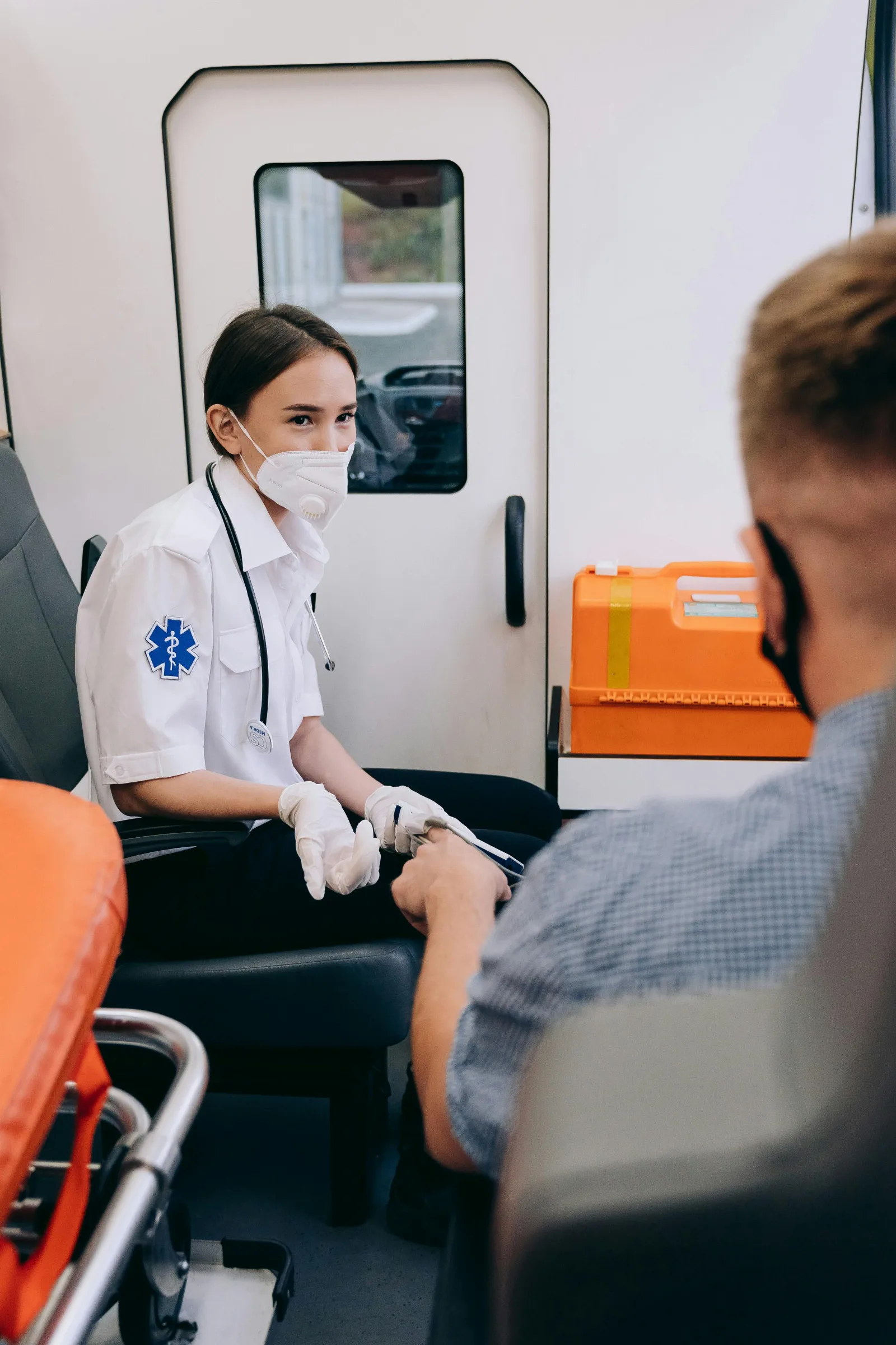Occupational therapist assisting patient with therapeutic activities and daily living rehabilitation